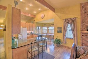 a kitchen with a table and chairs in a room at Charming Home with Yard about 12 Mi to Fort Collins in Loveland