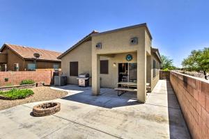 a house with a patio in front of it at Sahuarita Retreat with Grill about 24 Mi to Tucson! in Green Valley