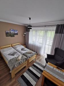 Posteľ alebo postele v izbe v ubytovaní Willa Mery