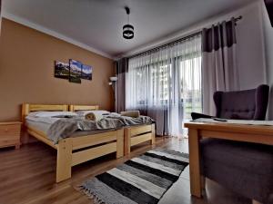 Posteľ alebo postele v izbe v ubytovaní Willa Mery