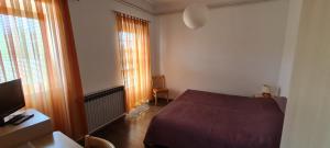 Voodi või voodid majutusasutuse Rooms Lara toas