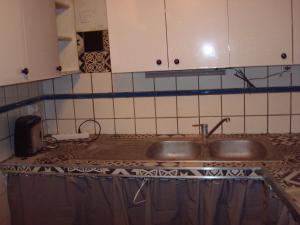 Kuchyň nebo kuchyňský kout v ubytování Chalet appartement + 17 fotografií