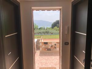 a door leading into a room with a view at Villa Vesuvio in Trecase