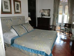 Postel nebo postele na pokoji v ubytování Palacio de la Rambla