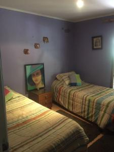 Postel nebo postele na pokoji v ubytování Casa San Alfonso Cajon del Maipo + 22 fotografií