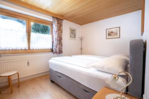 Posteľ alebo postele v izbe v ubytovaní Kaprun Apartments