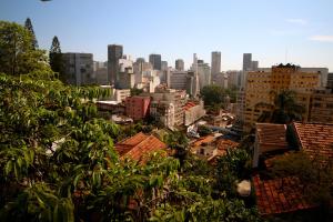 a view of a city with buildings and trees at Casa da Gente in Rio de Janeiro