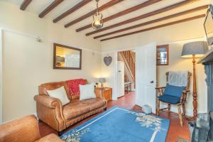 Posezení v ubytování Chapel Cottage