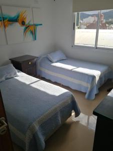 Ліжко або ліжка в номері El Descanso