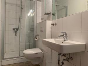 Et badeværelse på Kleine Brise Apartment 7