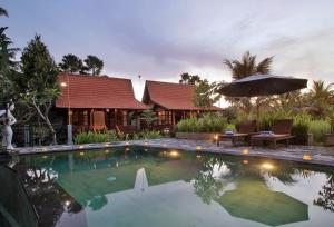 Swimmingpoolen hos eller tæt på Hanaya Ubud Villa