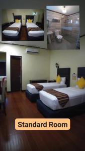 Letto o letti in una camera di The Ambassador Hotel