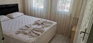 Postel nebo postele na pokoji v ubytování Nature Hotel Doğa Hotel Ölüdeniz