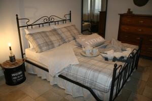 Postel nebo postele na pokoji v ubytování Casa Loconte