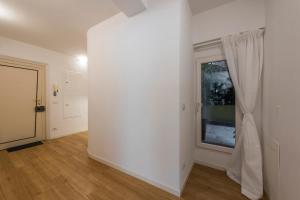 A bed or beds in a room at Vasari Suite Florence next to Pontevecchio