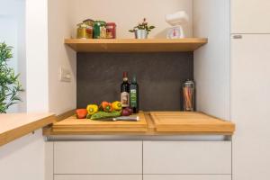 A kitchen or kitchenette at Vasari Suite Florence next to Pontevecchio
