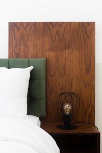 Postel nebo postele na pokoji v ubytování Suggrou Apartment