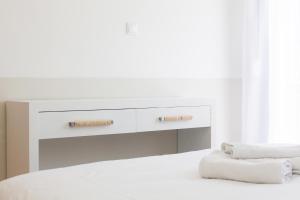 Postel nebo postele na pokoji v ubytování Suggrou Apartment