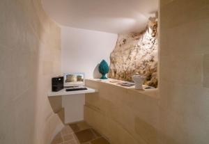 A kitchen or kitchenette at Dimora San Giuseppe Hotel & SPA