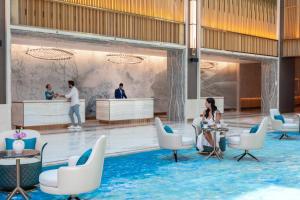 a rendering of the lobby of a hotel at Taj Exotica Resort & Spa, The Palm, Dubai in Dubai