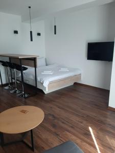 En eller flere senger på et rom på Ariš Kopaonik apartman A21