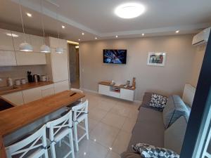 Posedenie v ubytovaní APARTAMENTY BARSKA 69