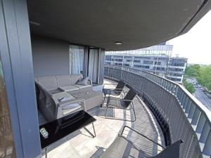 Balkón alebo terasa v ubytovaní APARTAMENTY BARSKA 69