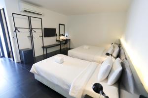 Postel nebo postele na pokoji v ubytování BED Nimman - Adults Only + 37 fotografií