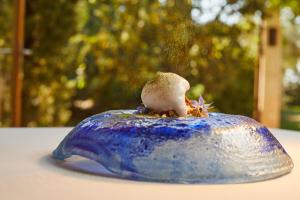 a blue object with a crab on top of it at Fontsanta Hotel Thermal & Spa - Adults Only in Colònia de Sant Jordi