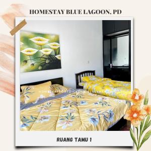 Katil atau katil-katil dalam bilik di Tanjung Biru Homestay Blue Lagoon
