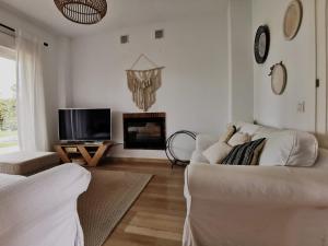 TV a/nebo společenská místnost v ubytování Chalet Novo sancti petri