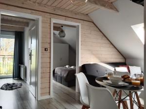 Posedenie v ubytovaní Apartamenty Równia 2