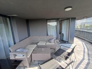 Posedenie v ubytovaní APARTAMENTY BARSKA 69