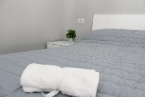 Posteľ alebo postele v izbe v ubytovaní Appartamento Cevedale11 + 8 fotografií