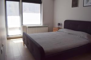 Ein Bett oder Betten in einem Zimmer der Unterkunft Pirotska 47 apartment
