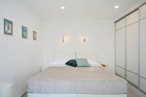 Säng eller sängar i ett rum på Apartment Hedera A10