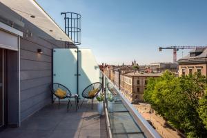 Balkón nebo terasa v ubytování InPoint Apartments G11 near Old Town & Kazimierz District & Parking Option