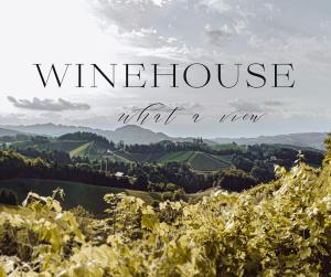 a view of a winery with the text win house what a year at WINEHOUSE Living in Leutschach