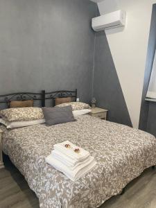 Postel nebo postele na pokoji v ubytování La Perla Del Golfo