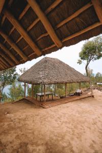 Imagem da galeria de Sextantio Rwanda, The Capanne (Huts) Project em Kamembe