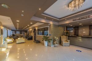 The lobby or reception area at Planos Beach Hotel