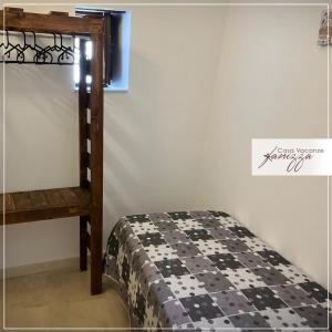 Ένα ή περισσότερα κρεβάτια σε δωμάτιο στο Trullo dei Santi +15 φωτογραφίες