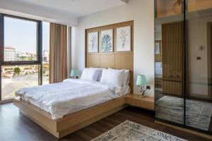 Säng eller sängar i ett rum på Gazioğlu Residence İstanbul
