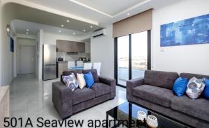 Część wypoczynkowa w obiekcie Lazuli City & Seaview Apartments