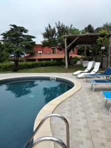 The swimming pool at or close to VILLA PIETRALTA