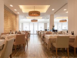 Reštaurácia alebo iné gastronomické zariadenie v ubytovaní Hotel Boutique Balandret