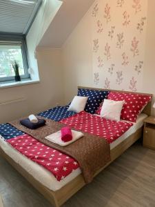 Posteľ alebo postele v izbe v ubytovaní Furó-Lak 2 Apartman Hajdúszoboszló