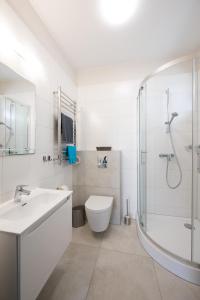 Koupelna v ubytování MEDUSA apartamenty i bungalowy + 37 fotografií