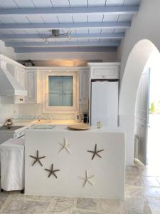 Kuchyňa alebo kuchynka v ubytovaní Villa Viento of Mykonos