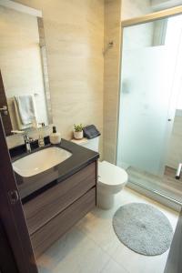 Et badeværelse på Apartamenteo Mira 4